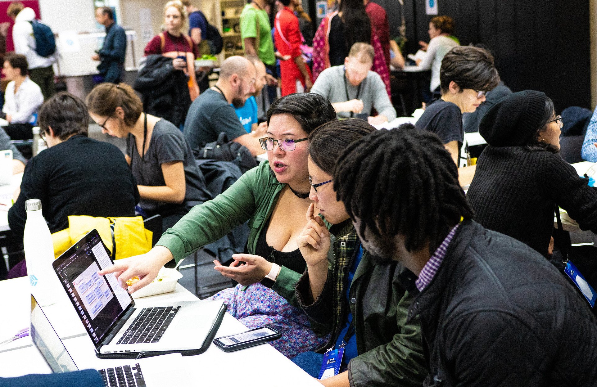 A group of participants taking part in a session at MozFest