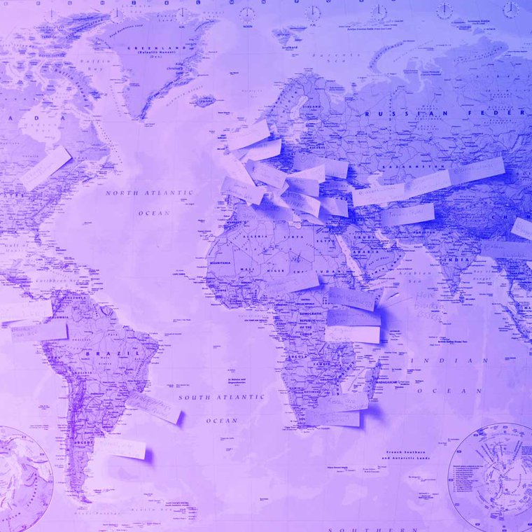 A map of the world, with post it notes attached showing the locations of different participants from MozFest.