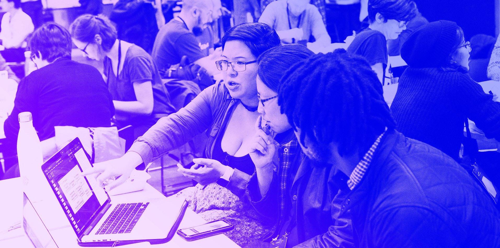 A group of attendees taking part in a session at MozFest